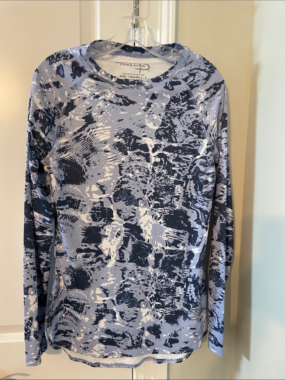 Reel Life women’s Long-Sleeve Performance Shirt in Light Blue Camo